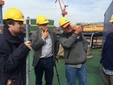 Axel Meiton, Alan Mix, and Chris Moser consulting on the set-up of sediment core processing on I/B Oden in June 2015.